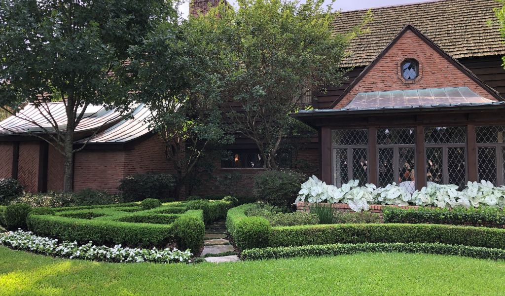 Beautiful Houston home with a strong summer garden maintenance routine