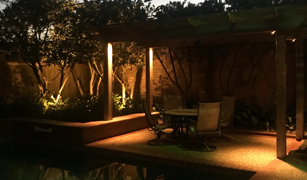 Elegant backyard with landscape lighting