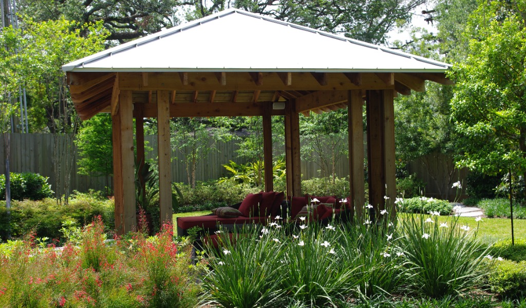 Elevate outdoor spaces with custom elements, like this wooden pergola designed for a client in Houston, Texas.