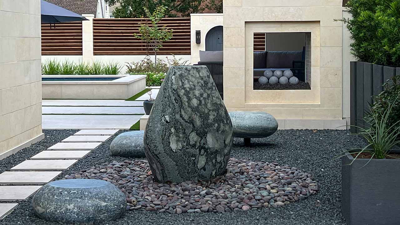 Stone sculpture and outdoor seating area